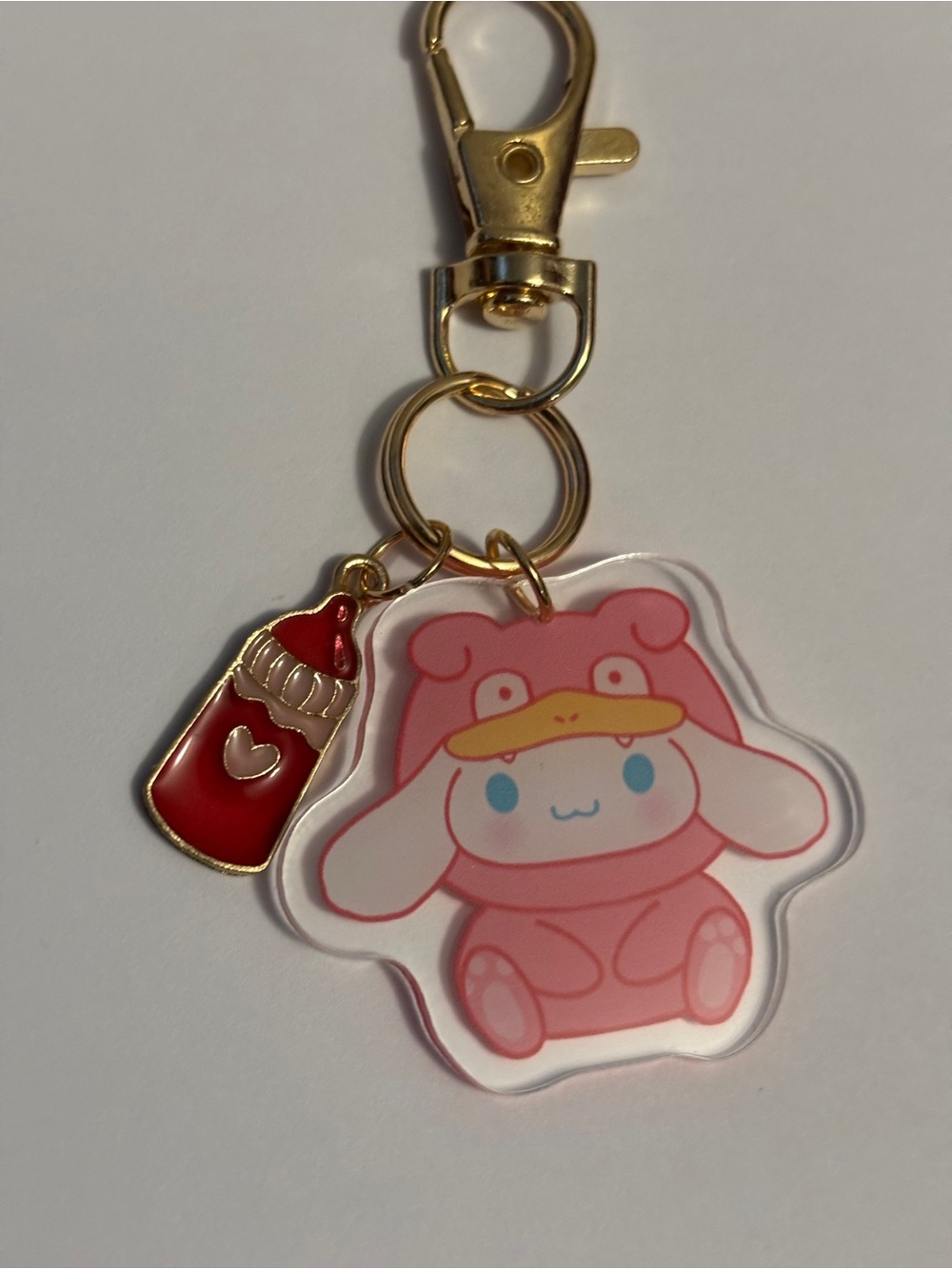 Handmade Hello Kitty Cinnamon Role as Duck inspired keychain/bag charm